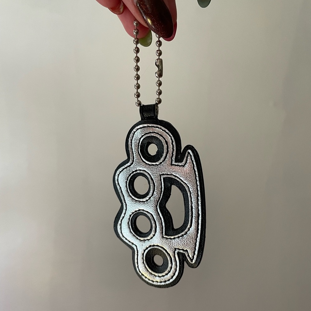 VINTAGE brass knuckles keychain